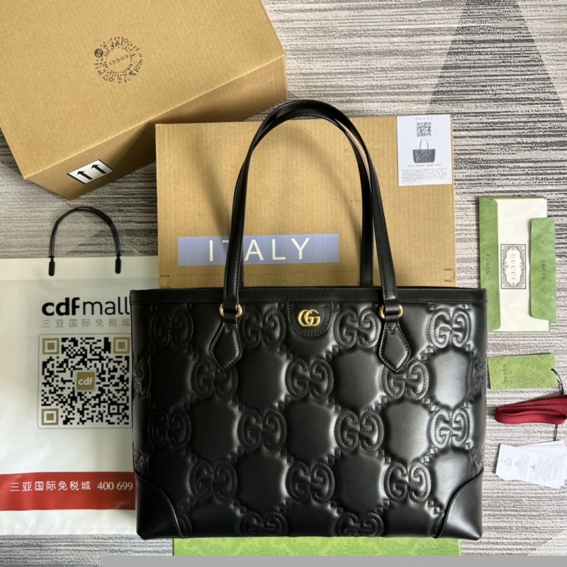G*u*i shopping bags